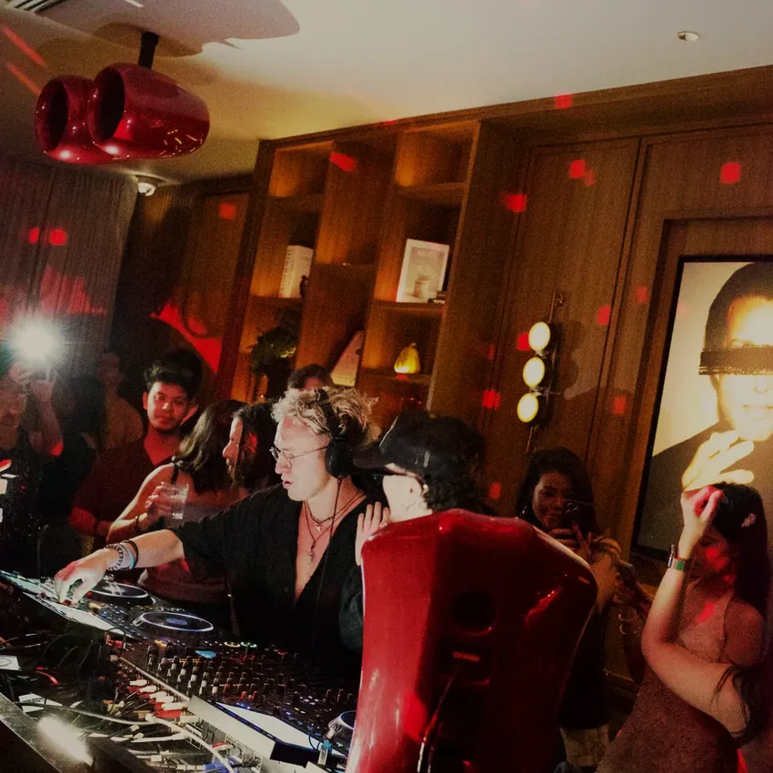 APT 101 penthouse room and crowd