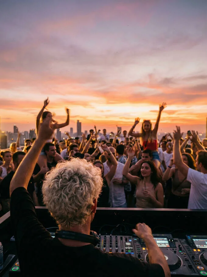 BYAS performing live on a Bangkok rooftop — melodic, afro and deep house